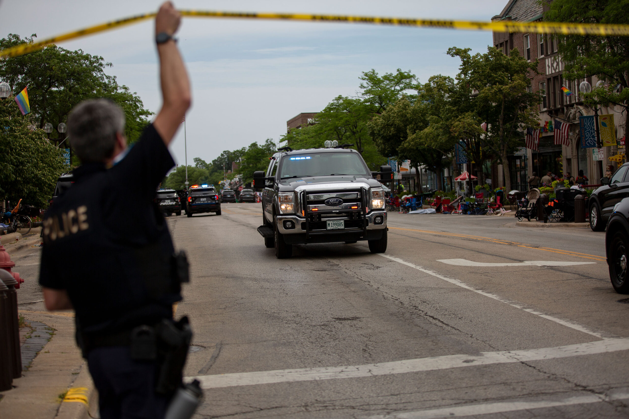 HIGHLAND PARK, IL – JULY 04: First responders work the scene of a shooting at a Fourth of July parade on July 4, 2022 in Highland Park, Illinois. Reports indicate at least five people were killed and 19 injured in the mass shooting. (Photo by Jim Vondruska/Getty Images)